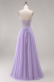 Robe de bal longue lilas tulle bustier ligne A appliquée