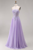 Robe de bal longue lilas tulle bustier ligne A appliquée