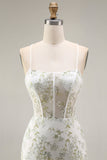 Robe de soirée longue sirène transparente bustier brodé de fleurs blanches et vertes avec fente