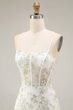Robe de soirée longue sirène transparente bustier brodé de fleurs blanches et vertes avec fente