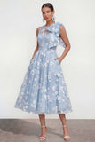 Robe d'invitée de mariage midi rose ligne A col rond nœud imprimé floral avec poches