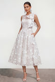 Robe d'invitée de mariage midi rose ligne A col rond nœud imprimé floral avec poches