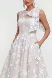 Robe d'invitée de mariage midi rose ligne A col rond nœud imprimé floral avec poches