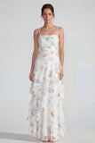 Robe maxi-fleurie multi-fleurs à bretelles fines blanches avec volants