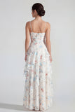 Robe maxi-fleurie multi-fleurs à bretelles fines blanches avec volants