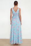 Robe fleurie en chiffon bleu fêlée sur le côté avec fleur 3D