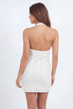 Robe courte blanche à paillettes scintillantes col nu