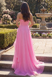 Robe de bal longue sans bretelles en tulle rose vif avec volants
