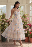 Robe d'invitée de mariage midi champagne tulle ligne A décolleté cœur appliquée