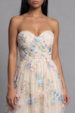 Robe d'invitée de mariage midi champagne tulle ligne A décolleté cœur appliquée