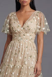 Robe d'invitée de mariage champagne tulle brodé col V manches fluides imprimé floral