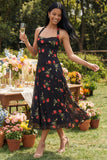 Robe midi à motifs floraux à motifs fourreau noir en chiffon