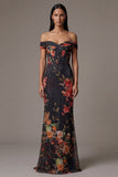 Robe noire à fleurs découpées à épaules découpées