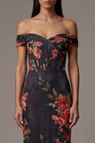 Robe noire à fleurs découpées à épaules découpées