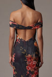 Robe noire à fleurs découpées à épaules découpées