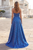 Robe longue à pois bleue sans anneau nœud avec fente