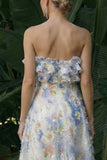 Robe longue à fleurs à volants bleu clair