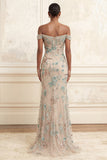 Robe de soirée longue champagne sirène épaules dénudées à sequins