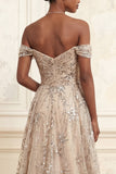 Robe de soirée longue champagne tulle sirène épaule dénudée froncée à paillettes