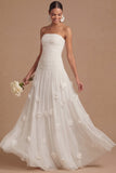 Robe longue blanche de réception de mariage blanche sans bustiers, fleurie appliquée à l’applique et à la ligne A