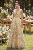 Robe longue fleurie brodée en tulle jaune à col en V