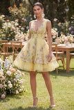 Robe mini fleurie brodée en tulle jaune à col en V