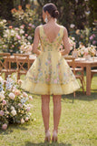 Robe mini fleurie brodée en tulle jaune à col en V