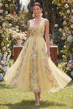 Robe midi fleurie brodée en tulle à col carré en ligne A