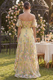 Robe fleurie brodée en tulle jaune à traînes dénudées, manches bouffantes