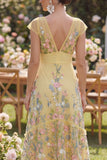 Robe fleuriste brodée en A jaune en tulle à manches courtes