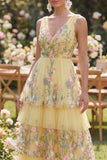 Longue robe fleurie brodée en V à étages en tulle jaune