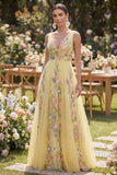 Robe Maxi brodée florale à décolleté en V jaune pastel
