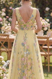 Robe Maxi brodée florale à décolleté en V jaune pastel