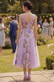 Robe midi fleurie midi brodée en tulle lilas ligne A
