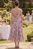 Robe midi fleurie midi brodée en tulle lilas à la ligne décollée