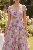 Robe midi fleurie midi brodée en tulle lilas à la ligne décollée