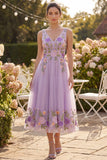 Robe midi fleurie midi brodée en tulle lilas à col en V