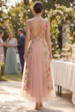 Robe midi à fleurs brodées en tulle en tulle à col en V