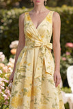 Robe Midi en ligne à un nœud en beurre fleural jaune à col en V avec un nœud