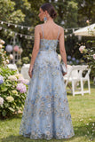 Robe longue fleurie bleue en tulle perlé à perles et fronçées