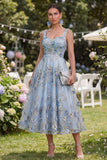 Robe midi fleurie midi plissée en tulle bleu ligne A