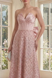 Corset busté à blush Une robe midi à la ligne nœud