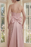 Corset busté à blush Une robe midi à la ligne nœud