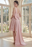 Robe midi à fard à joues étincelante à col V avec un large nœud