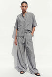Costume féminin long à un seul poitrine gris à col rond avec ceinture