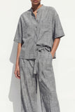 Costume féminin long à un seul poitrine gris à col rond avec ceinture