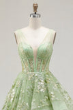 Corset A vert à col en V appliqué et longue robe de bal avec volants