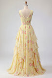 Robe de bal longue jaune fleurie, col en V, volants et nœud