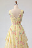 Robe de bal longue jaune fleurie, col en V, volants et nœud