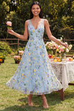 Robe Maxi bleue à col en V à fleurs en V